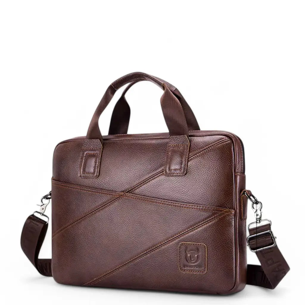 Bruine leren werktas met diagonale stiksels, handgrepen en afneembare schouderband, perfect voor een laptop van 14 inch