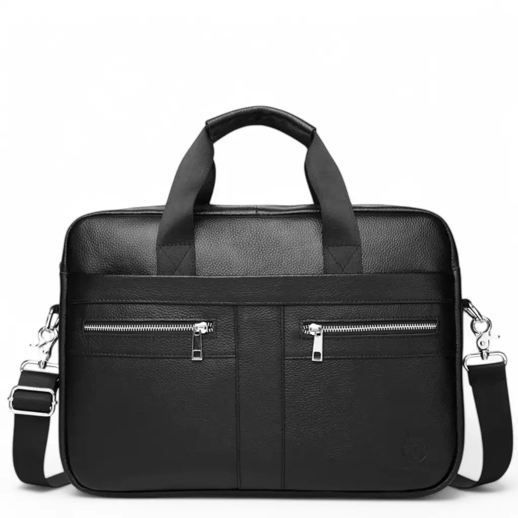 Mooie laptoptas heren 15.6 inch zwart gemaakt van hoogwaardig leer met dubbele ritsvakken aan de voorzijde. De elegante tas heeft stevige handgrepen, een afneembare schouderband met zilverkleurige bevestigingen en biedt ruime opbergruimte voor laptops tot 15.6 inch.