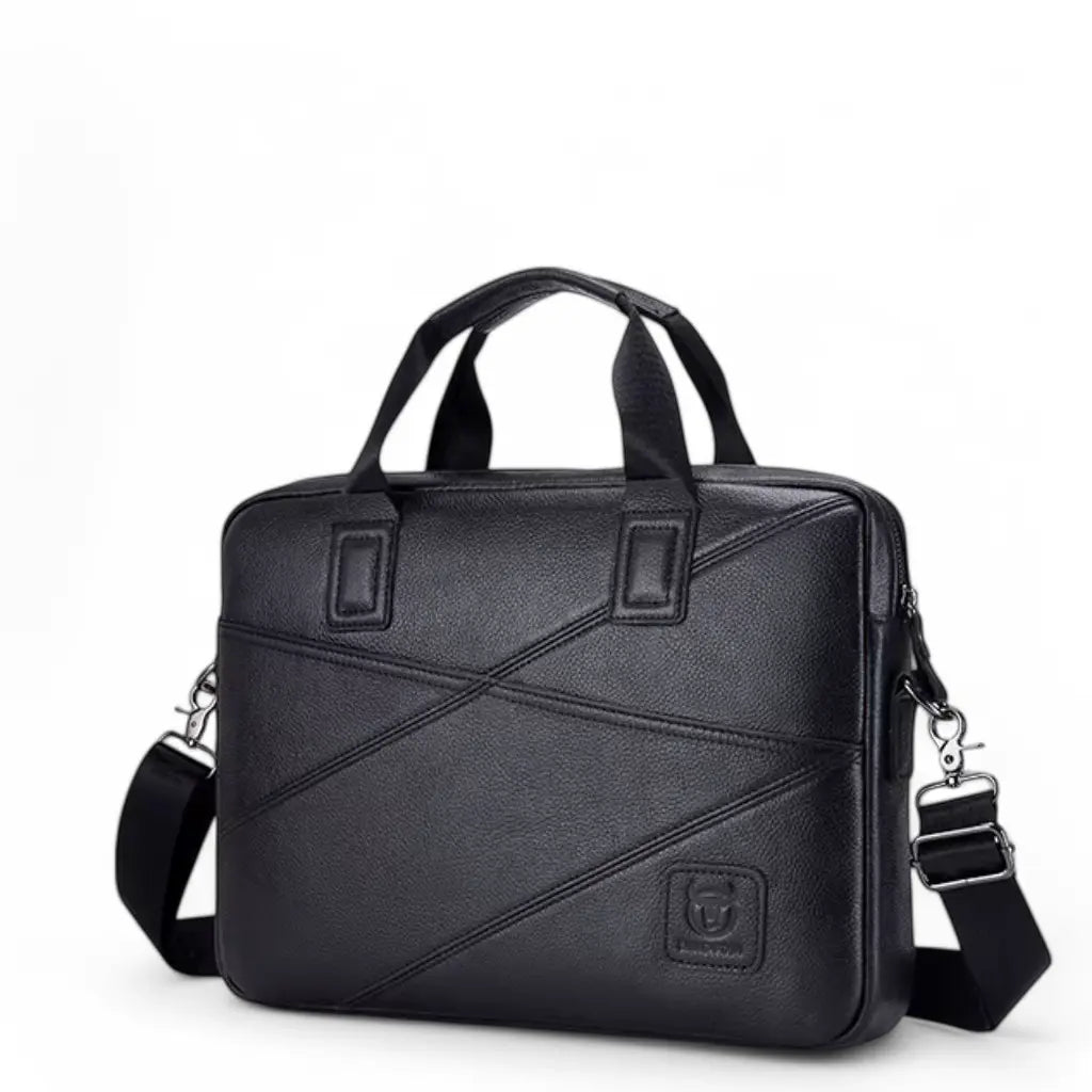 Zwarte leren laptoptas 14 inch gefotografeerd tegen een donkere achtergrond, met stijlvol diagonaal stikselpatroon