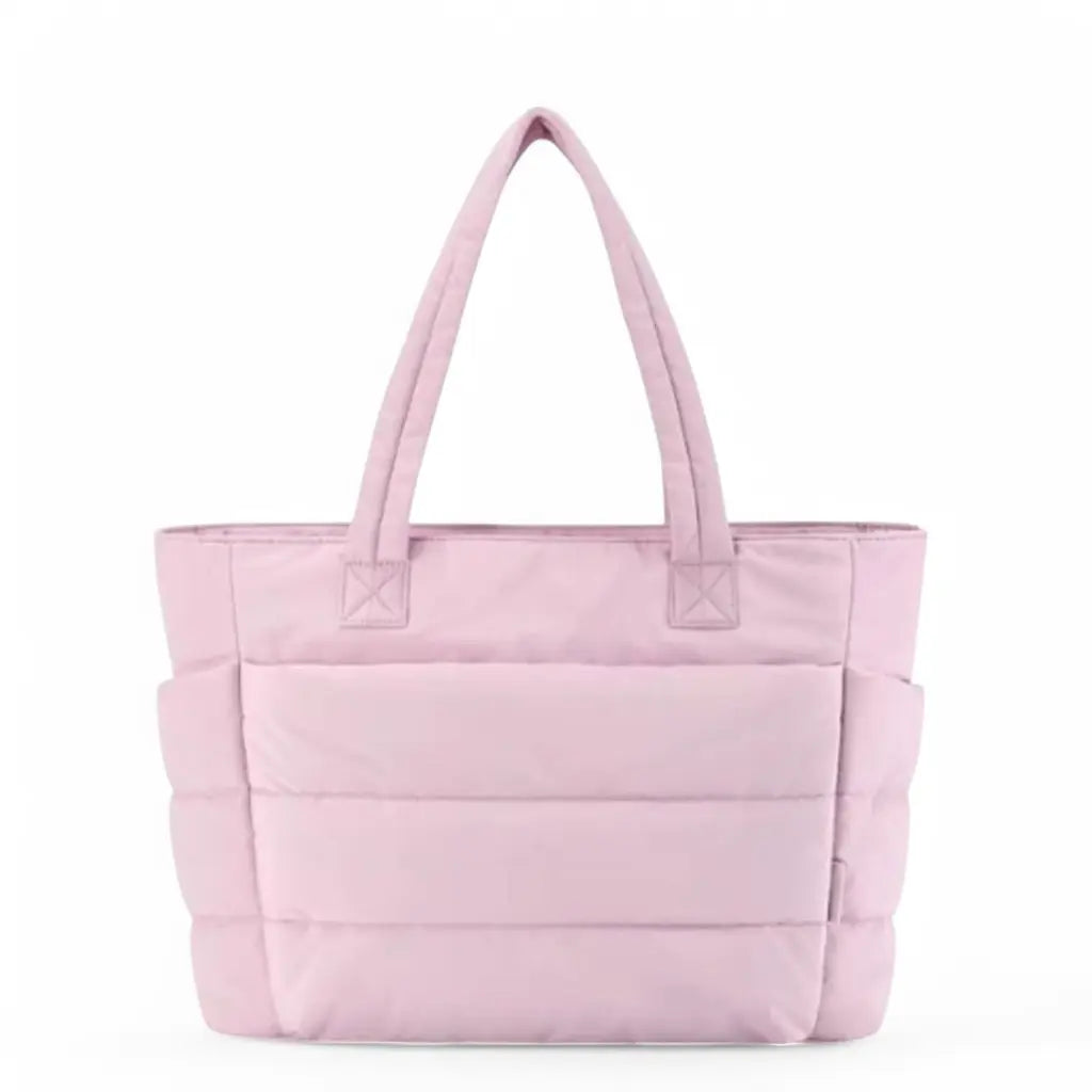 Lichtroze variant van de coole laptoptas dames 15.6 inch, perfect voor een stijlvolle maar functionele draagoptie.