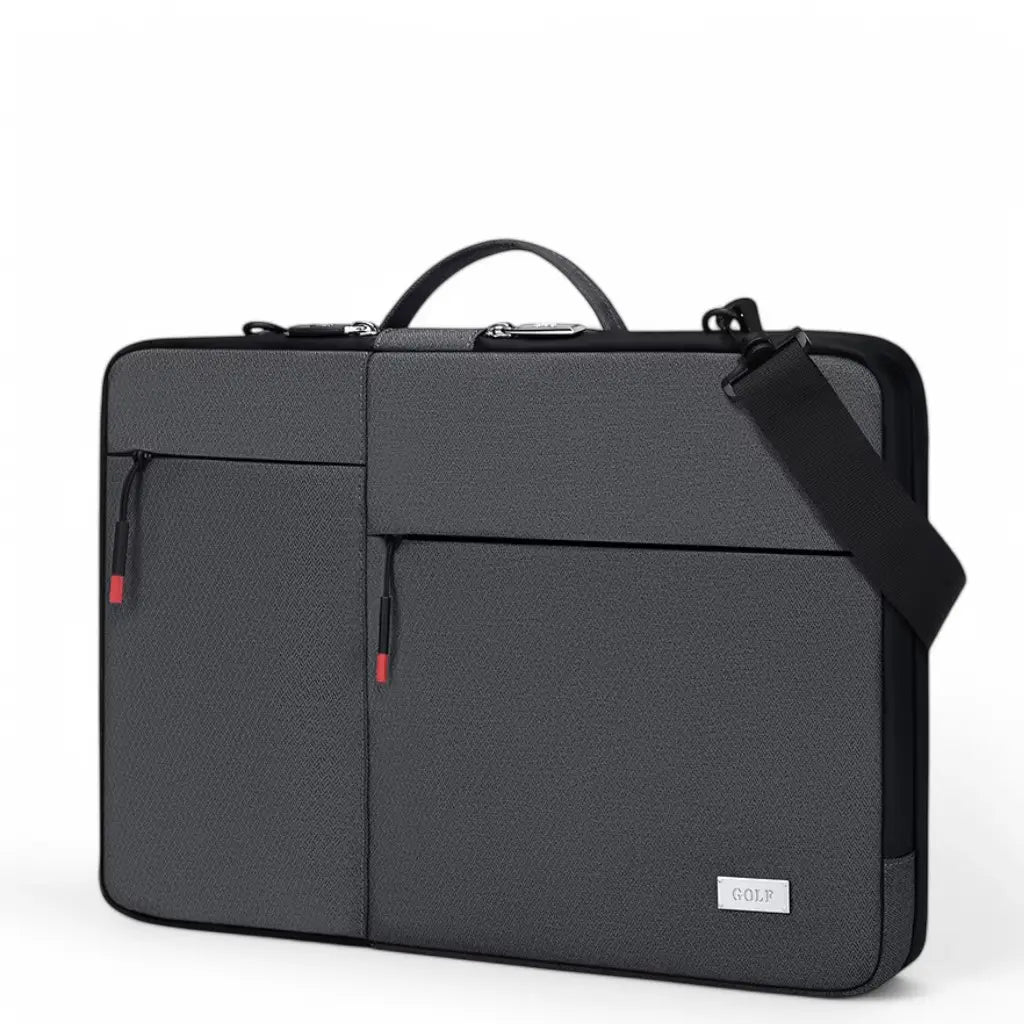 De laptoptas dames schokbestendig met bevestigde schouderriem voor veelzijdig draagcomfort. Het grijze materiaal is voorzien van een subtiele textuur die krasgevoeligheid vermindert en voor een premium uitstraling zorgt tijdens zakenreizen of dagelijks gebruik.