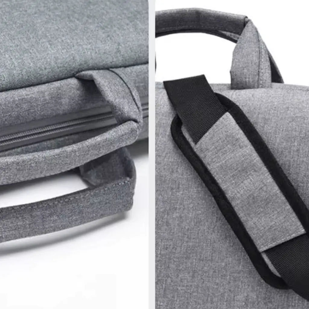 Close-up details van de laptoptas heren 13 inch grijs, met focus op de verstevigde handgreep, ritssluiting en gewatteerde schouderriem voor optimaal draagcomfort.