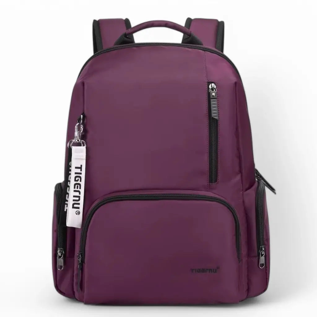 Laptop rugzak 14 inch paars met een modern ontwerp, ritssluitingen aan de voorkant en stevige handgreep.