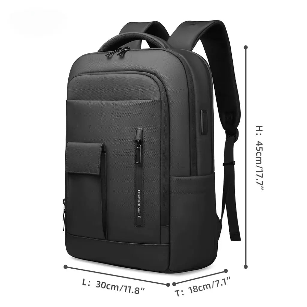 Laptop rugzak 16 inch zwart met open compartimenten, gevuld met een laptop, koptelefoon, tablet en andere accessoires.