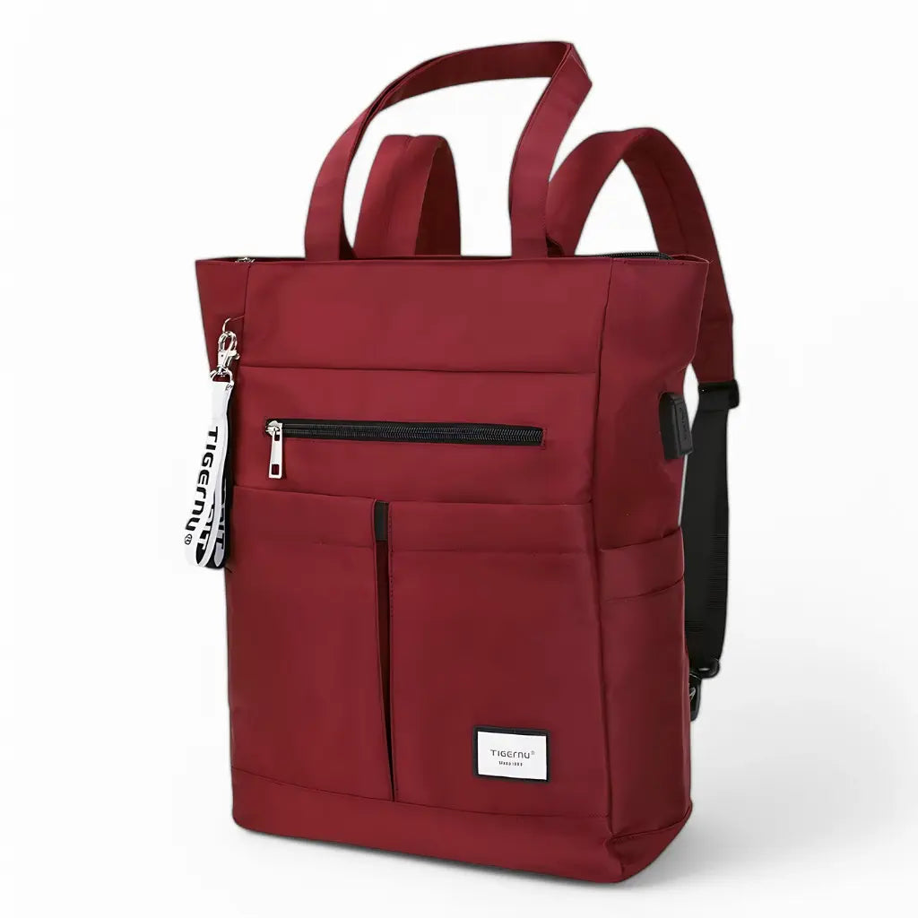 Laptop rugzak dames 15.6 inch rood met stijlvol en modern ontwerp, voorvak met rits en verstelbare schouderbanden.