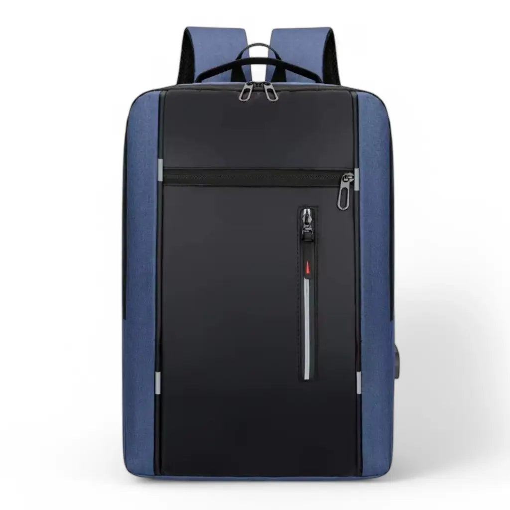 Een stijlvolle laptop rugzak heren 15.6 inch compact blauw met zwart voorpaneel. De rugzak heeft een modern ontwerp met blauwe zijkanten en een zwart middenpaneel. Voorzien van meerdere vakken met ritssluiting, waaronder een verticale rits met reflecterende streep voor extra zichtbaarheid. Het compacte design combineert functionaliteit met een professionele uitstraling.