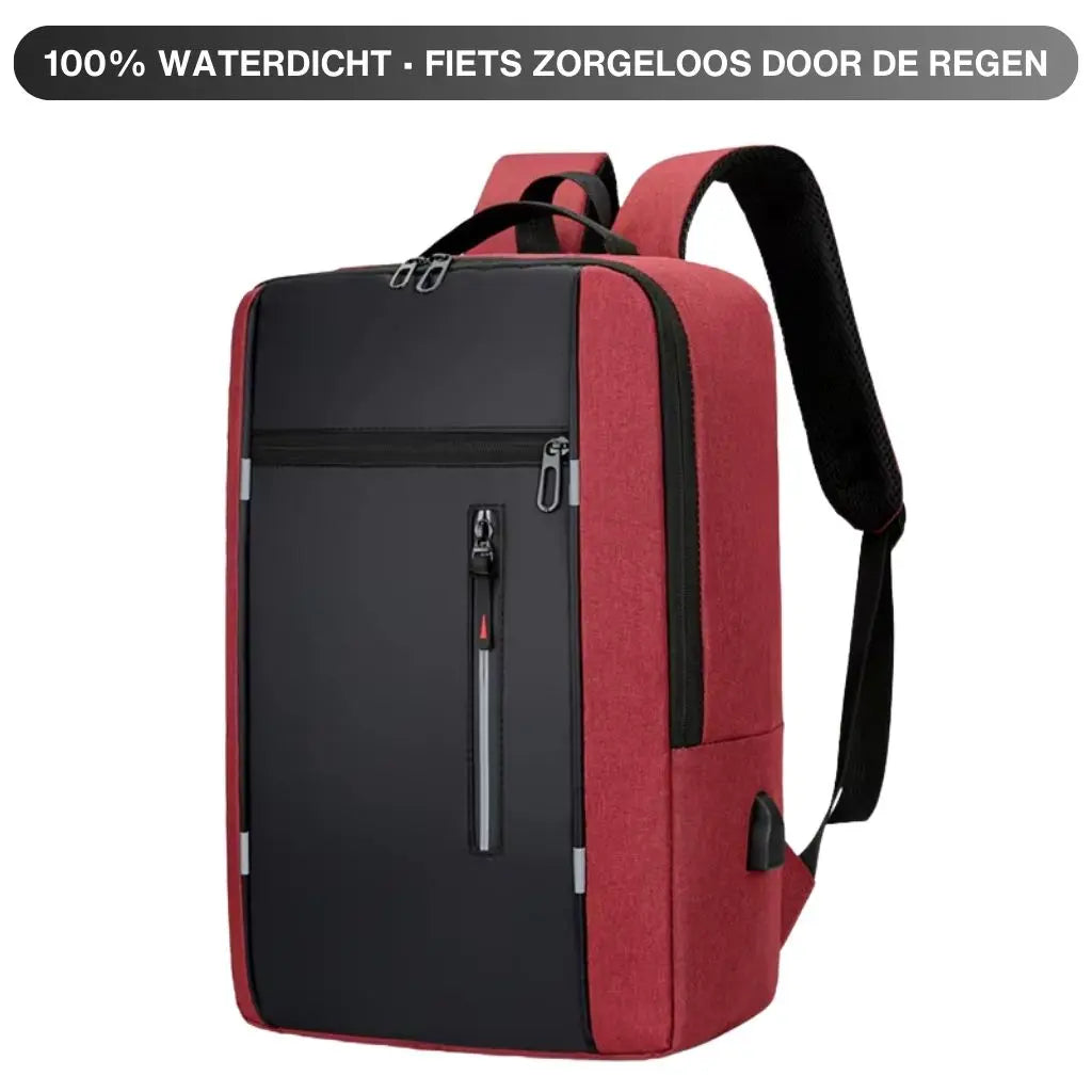 Een laptop rugzak heren 15.6 inch compact rood met de tekst "100% waterdicht - fiets zorgeloos door de regen" erboven. De afbeelding toont de rugzak van opzij, met zichtbare USB-laadpoort en ergonomische zwarte schouderbanden. De waterdichte eigenschappen maken deze rode rugzak perfect voor het Nederlandse klimaat, ideaal voor dagelijks gebruik tijdens woon-werkverkeer op de fiets, zelfs bij slecht weer.