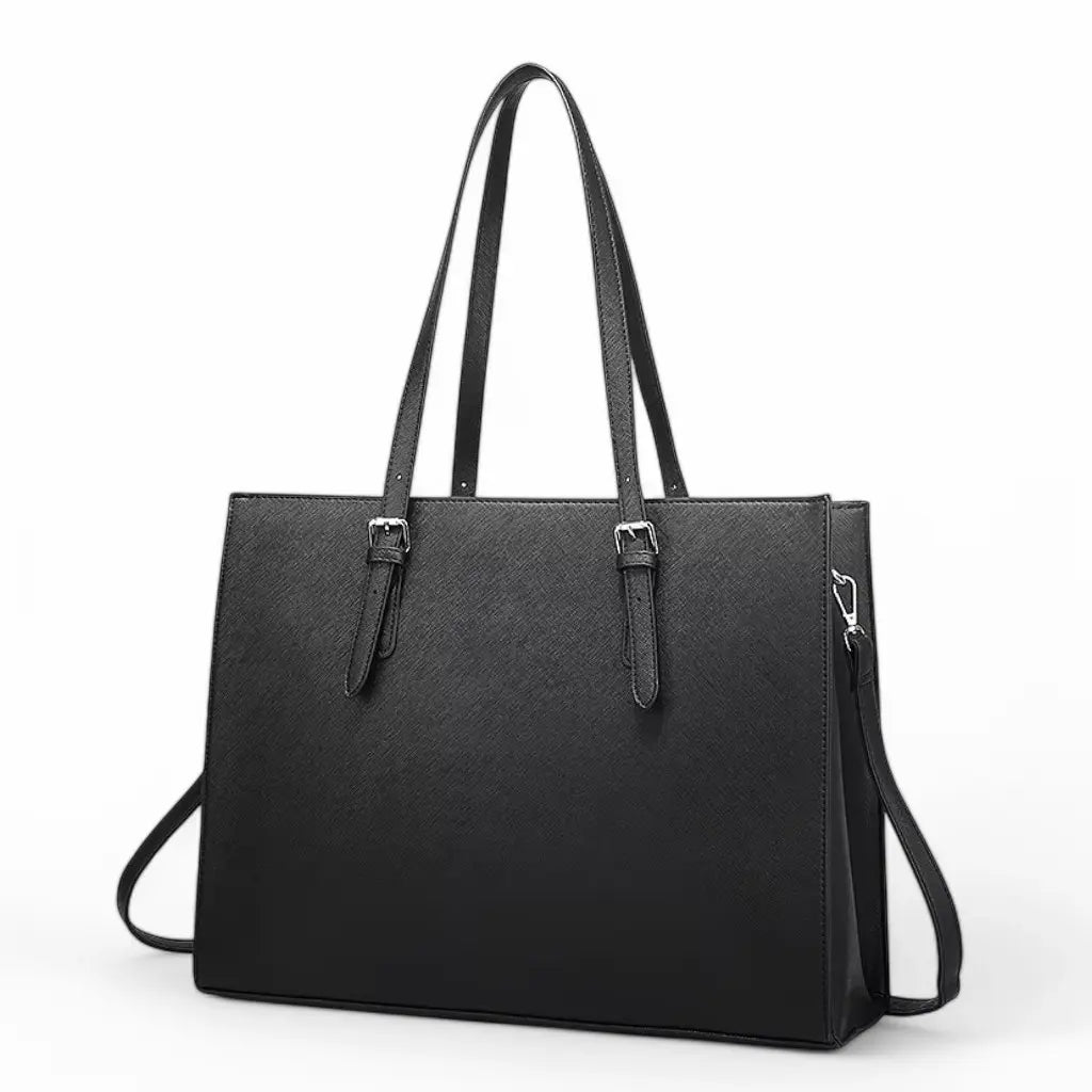 Zwarte laptoptas shopper 15.6 inch vanaf de zijkant gefotografeerd, met duidelijk zichtbare dubbele handgrepen en afneembare schouderband.