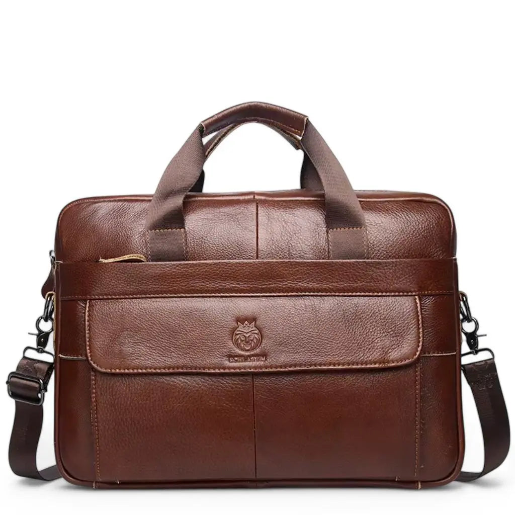 Leren laptoptas heren 15 inch gemaakt van hoogwaardig bruin leer met het Scellatum-logo, stevige draaggrepen, een praktisch voorvak en een verstelbare schouderband voor optimaal draagcomfort tijdens woon-werkverkeer.