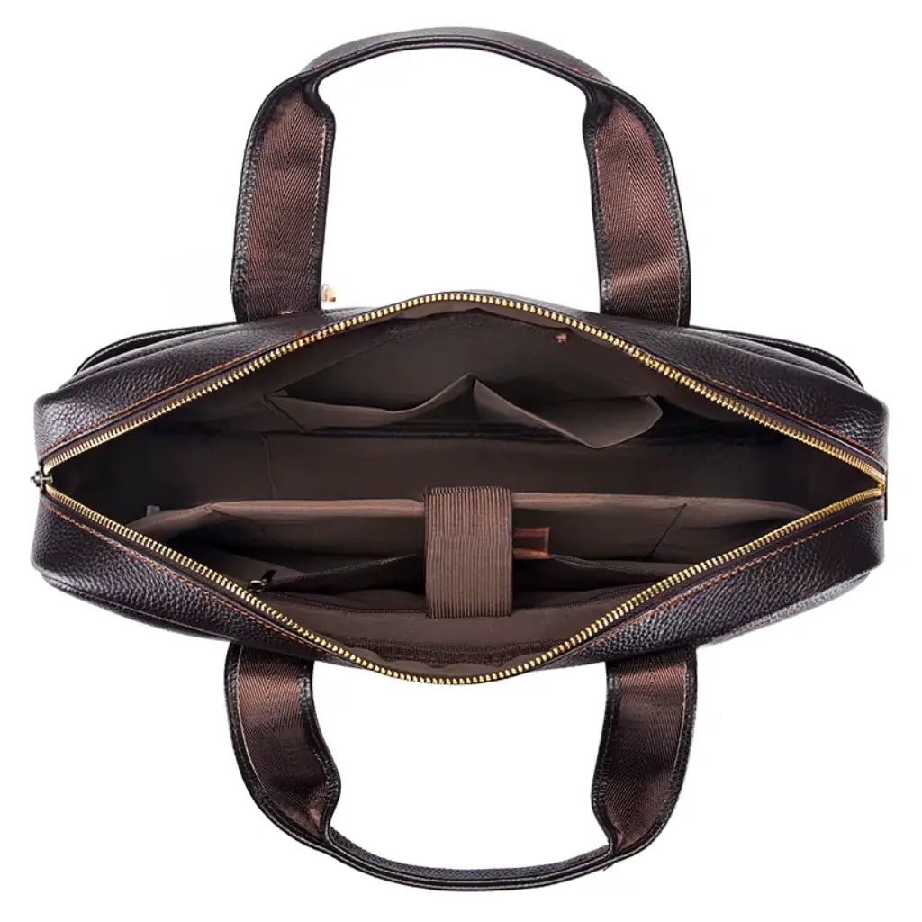 Binnenzijde van de leren werktas heren 16 inch met verschillende vakken en compartimenten voor laptops en documenten.