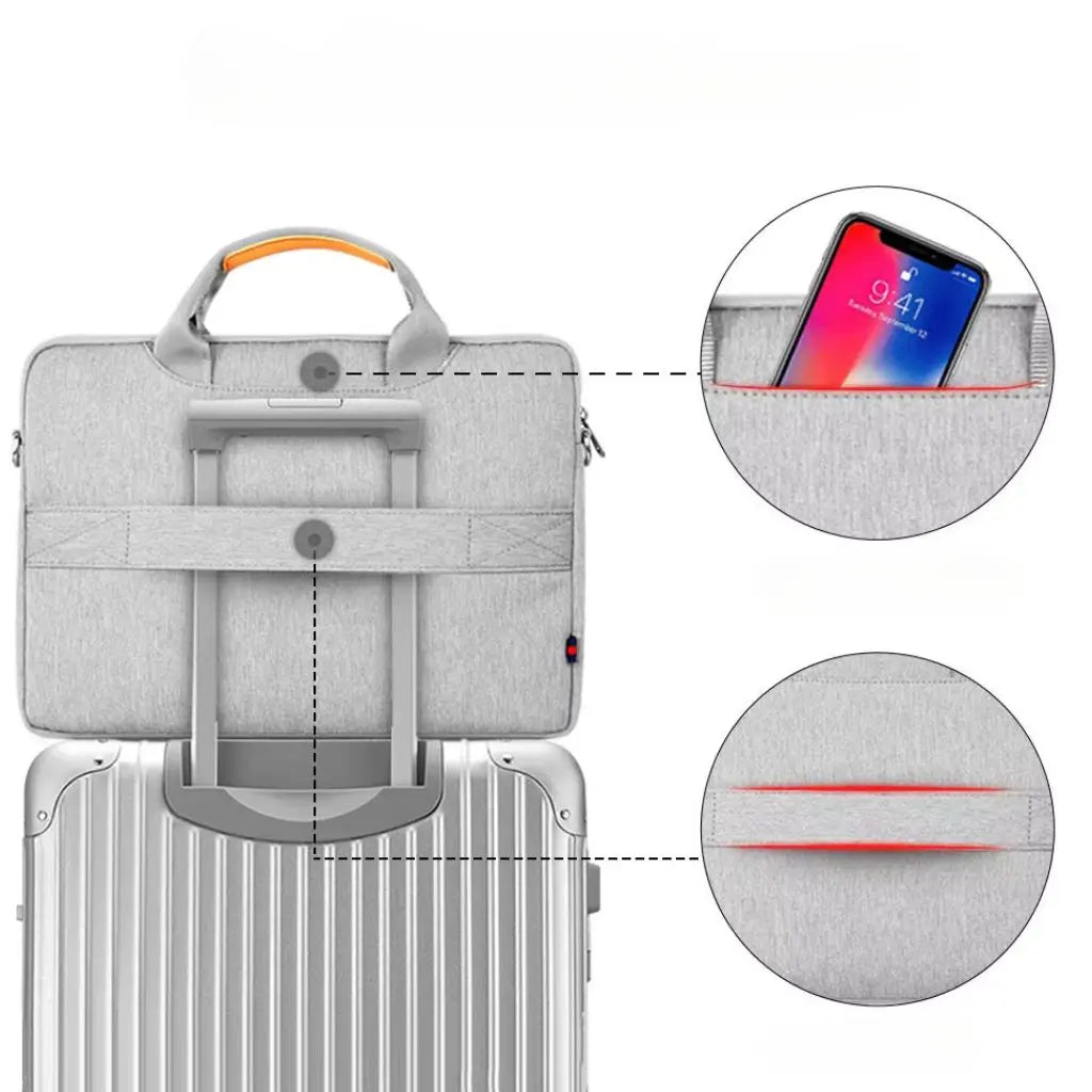 Laptoptas dames 16 inch grijs met trolley-functie, toont hoe de tas over een koffer kan worden geschoven met handige telefoonvakken aan de achterkant en bovenkant.