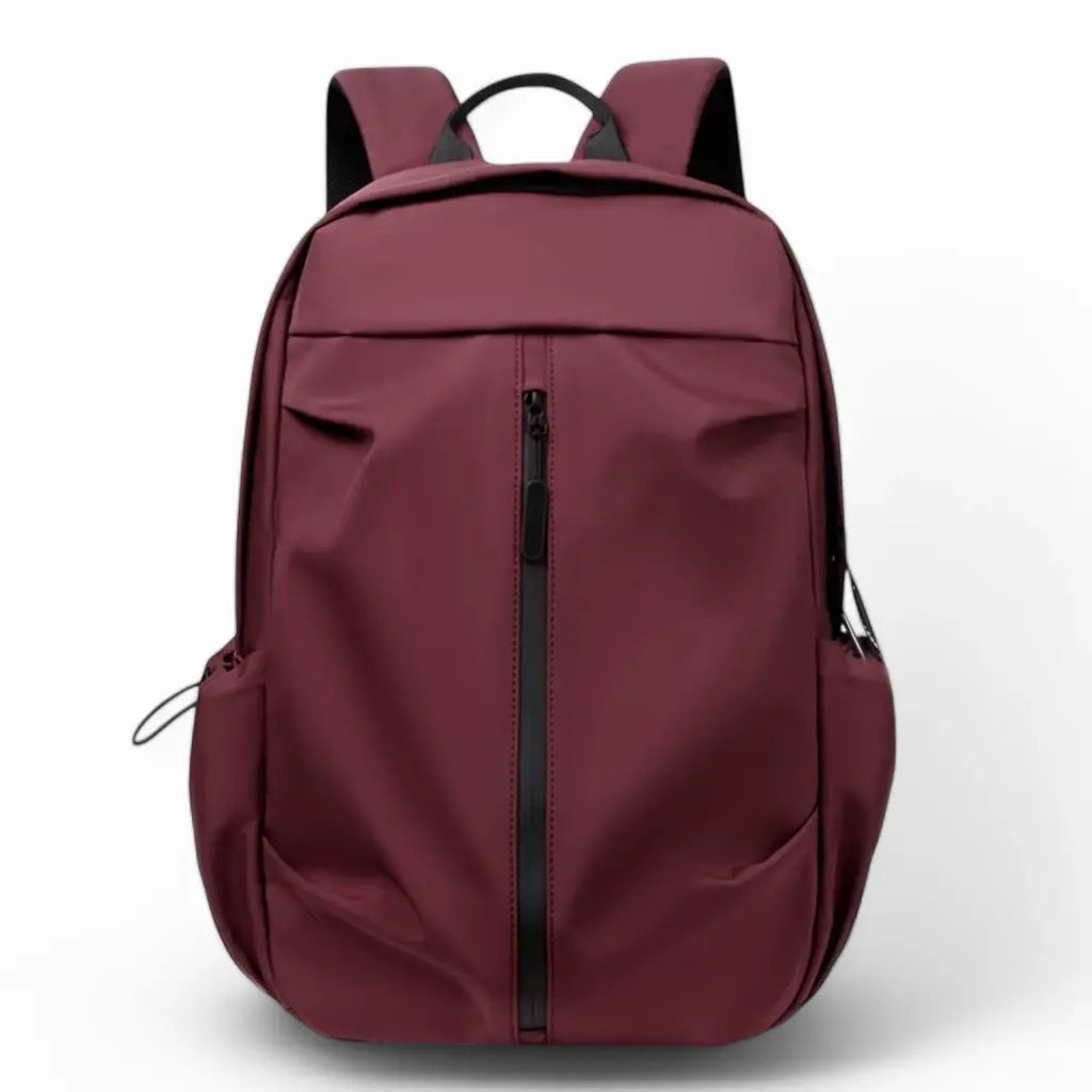 Rode werk rugzak voor dames van 14 inch met een strak en waterbestendig ontwerp, voorzien van een verticale ritssluiting.