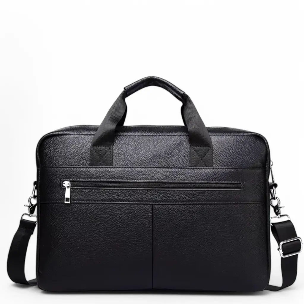 Vooraanzicht van de zakelijke laptoptas heren 15 inch zwart met functioneel voorvak met ritssluiting. De zwarte lederen laptoptas heeft een strakke, professionele uitstraling met verticale stiksels, stevige handgrepen en zilverkleurige hardware voor een zakelijke en tegelijk stijlvolle look.